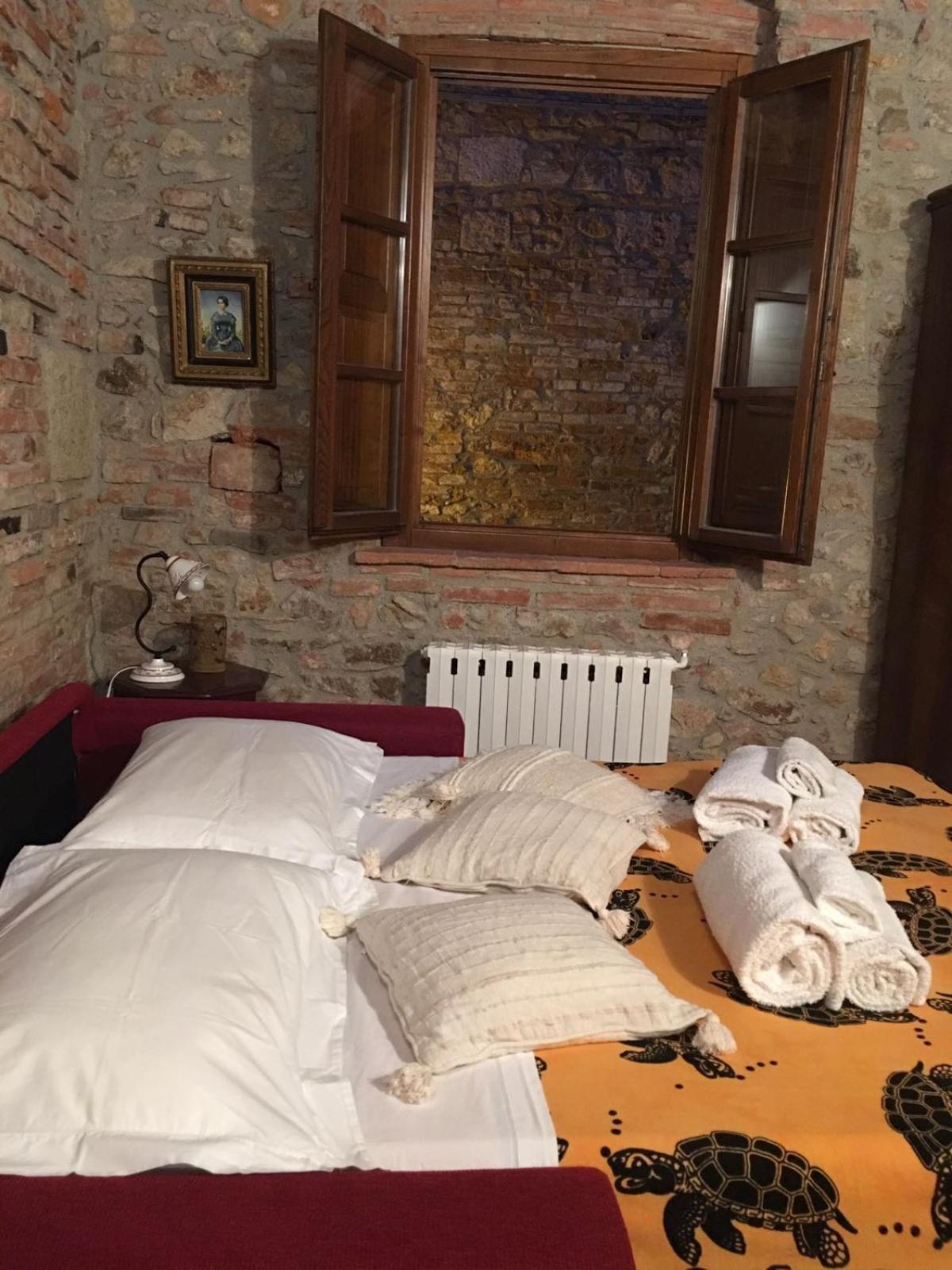La Divina Dimora Il Castello Degli Spiriti Magni Apartman Montepescali Kültér fotó